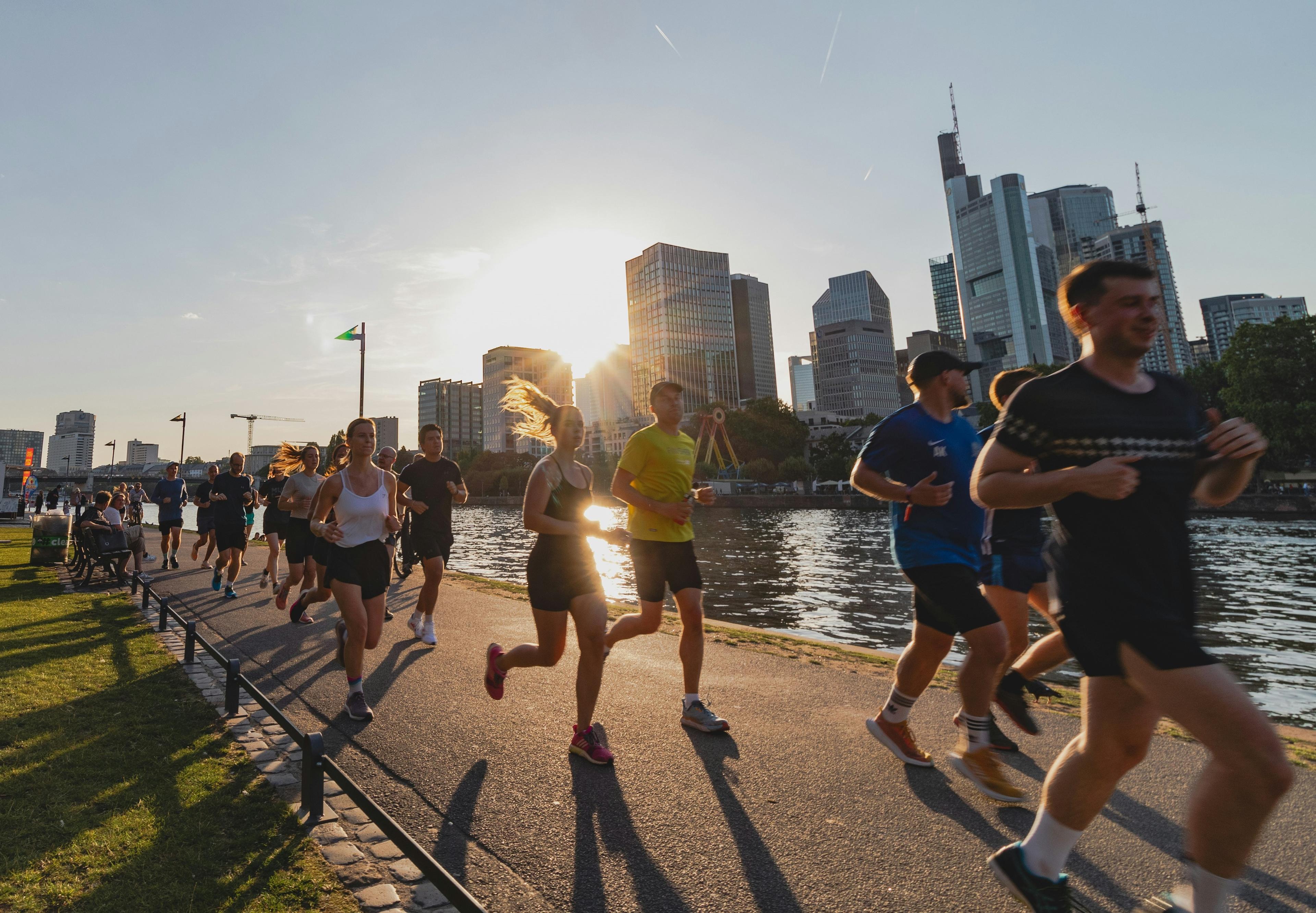 Team running at sunset